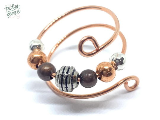 Immerse Yourself in the Tranquil Beauty of Handcrafted Copper Rings for Women