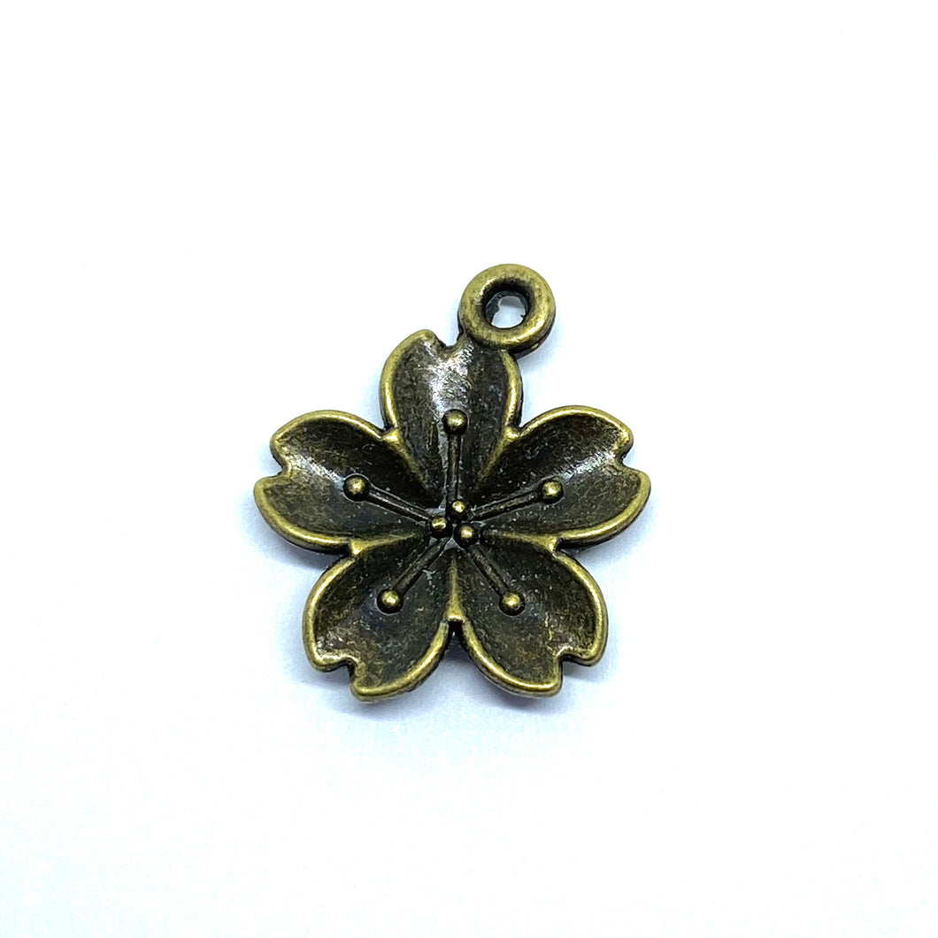 Small Bronze Tropical Flower